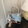 Mini light blue denim crossbody bag with silver star charm and metallic handle - Light Blue With Pendant