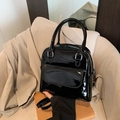 Glossy black patent leather handbag with adjustable strap and dual top handles - Black without Pendant