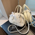 Creamy beige litchi texture handbag with 'JUST FOR YOU' ribbon and silver hardware - Off White