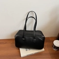 Chic black lychee leather pillow bag with long shoulder straps and silver zippers - Black
