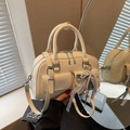 Cream white Boston handbag with decorative pearl bow and adjustable shoulder strap - Off-White (With Pendant)