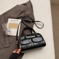 Chic black Boston bag with dual buckle pockets and adjustable shoulder strap - Black