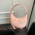 Pink lychee leather hobo bag with silver rivets and adjustable shoulder strap - Pink
