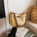 Yellow litchi pattern leather bucket bag with silver chain handle and shoulder strap - Yellow