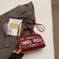 Vintage wine red Boston bag in glossy PU leather with dual pockets and shoulder strap - Red