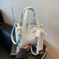 Light blue lychee grain bucket bag with pearl lace charm and adjustable strap - Blue