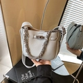 Light blue lychee texture bucket bag with silver chain handle and twist lock closure - Blue