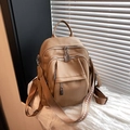 Khaki faux leather backpack with litchi texture and arrow patterned woven straps - Brown