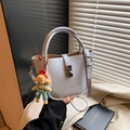 Grey-blue leather bucket bag with silver twist lock and cute cartoon doll charm - Blue with Charm