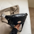 Minimalist black leather waist bag with unique embroidery and adjustable nylon strap - Black