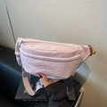 Light purple canvas chest bag with brand embroidery and orange label tag accessory - Purple