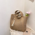 Brown woven straw tote bag with large capacity, white tassel detail and top handles - Khaki