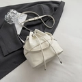 Chic white drawstring bucket bag with pleated texture and adjustable strap on a blazer - No Pendant / Off White
