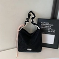 Black faux suede tote bag with ruffled handles and long pink drawstring detail - Black