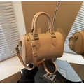 Detail of apricot canvas Boston bag with leather handles and gold metal hardware - Milk White