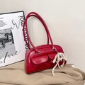 Glossy red faux leather bowling shoulder bag with cargo pockets and bow charm - Red with Pendant