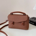 Retro tan canvas crossbody bag with leather handles and silver hardware for women - Biscuit