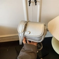Silver lychee grain faux leather crossbody saddle bag with flap button and adjustable strap - Silver
