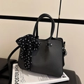 Klassische schwarz-graue Umhängetasche in Eimerform mit Polka-Dot-Schleife am Griff - Schwarz
