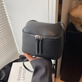 Mini black pebbled leather crossbody bag with dual silver zippers and slim strap - Black