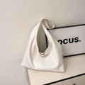 Minimalist white canvas hobo bag with wide shoulder strap and large capacity design - White