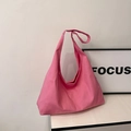 Pink canvas tote bag with wide shoulder straps in a minimalist aesthetic scene - Rose Pink