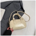 Creamy beige bowling handbag in smooth synthetic leather with dual top handles and strap - Apricot No Pendant