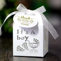 White laser-cut baby carriage candy box with 'It's A Boy' hollow text and white satin ribbon - White