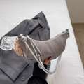 Silver-grey crescent crossbody bag with quilted texture and plush bear charm accent - Gray With Pendant