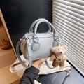 Light blue lychee texture leather bowling bag with teddy bear pendant and shoulder strap - Dusty Blue (With Charm)