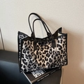Large capacity tote bag with black and white leopard print and fabric top handles - Black