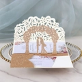Detail of 3D rose gold glitter wedding invitation with laser-cut arch and couple silhouette - Glitter Rose Gold