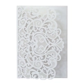 Detailed laser-cut baroque floral patterns on a white wedding invitation cover - White