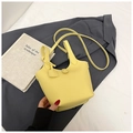 Minimalist light yellow leather bucket bag with top handles and detachable shoulder strap - No Pendant / Yellow