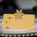 Tarjeta de mesa dorada con copo de nieve cortado con láser para bodas y fiestas navidad - Dorado