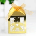 Exquisite gold hollow baby bear candy box with heart cutout and yellow ribbon bow - Reflective Gold