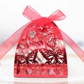 Red metallic wedding favor box with laser-cut butterfly patterns and a ribbon bow - Red
