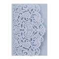 Macro view of laser-cut filigree pattern on light lavender purple invitation cover - Fog Blue