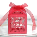 Close-up of red hollow laser-cut gift box with thank you text and silk ribbon bow - Pearlescent Red