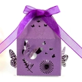 Detail of laser-cut butterfly gift box in deep purple cardstock with satin ribbon bow - Dark Purple