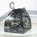 Detailed laser-cut black floral gift box featuring a delicate black organza ribbon bow - Reflective Black