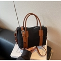 Sac Boston en toile noire avec poignées en cuir marron et détails de bandoulière - Noir
