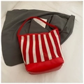 Fashionable red and white striped mesh bucket tote bag with leather strap detailing - Red Large
