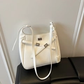 Ivory white PU leather bucket bag with silver twist lock and crossbody strap - White