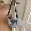 Detail of Gingham half-moon crossbody bag with adjustable striped shoulder strap - Black
