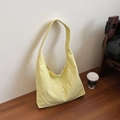Light yellow canvas hobo shoulder bag with embroidered logo for daily casual use - Yellow