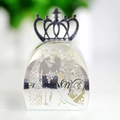 Macro view of silver laser-cut wedding candy box with Mr & Mrs and crown detail - Reflective Silver