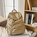 Minimalist khaki drawstring backpack made of high-quality fabric on a silver suitcase - Khaki