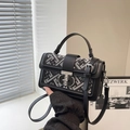 Structured black square bag with ethnic geometric jacquard and metal T-shaped lock - Black