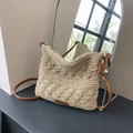 Chic cream woven straw crossbody bag featuring premium brown leather strap and zip closure - Off-white